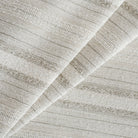 Acadia Stripe Salt Fabric, an oatmeal, white and grey striped high-performance upholstery fabric from Tonic Living.