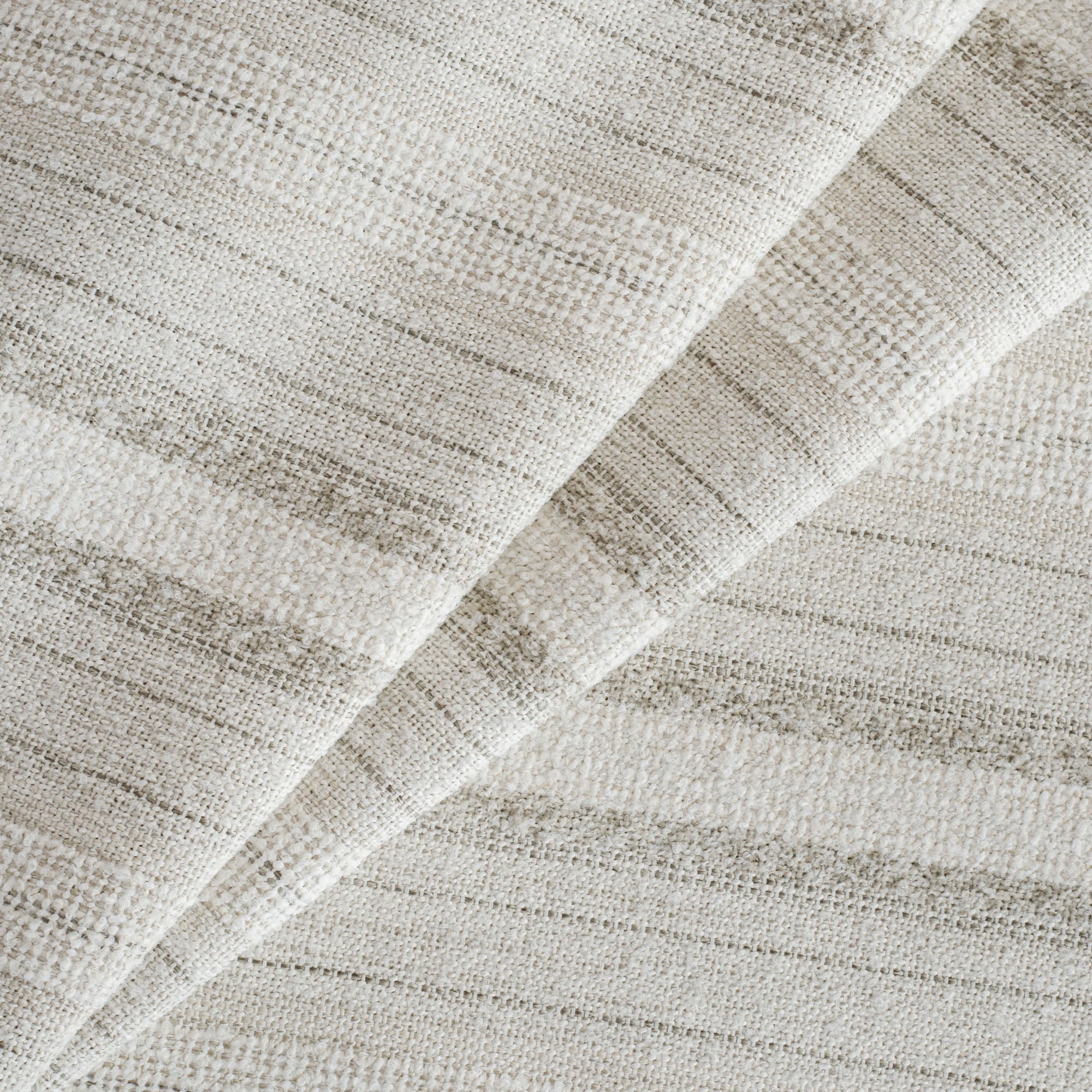 Acadia Stripe Salt Fabric, an oatmeal, white and grey striped high-performance upholstery fabric from Tonic Living.