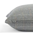 a heather grey windowpane check throw pillow: close up zipper view