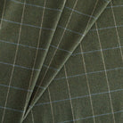 Addison Plaid Fabric Moss, a green windowpane check, wool blend home decor fabric from Tonic Living