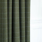 a moss green, beige and light blue drapery fabric from Tonic Living