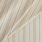 a beige, cream, ochre yellow and tan brown striped multi use home decor fabric