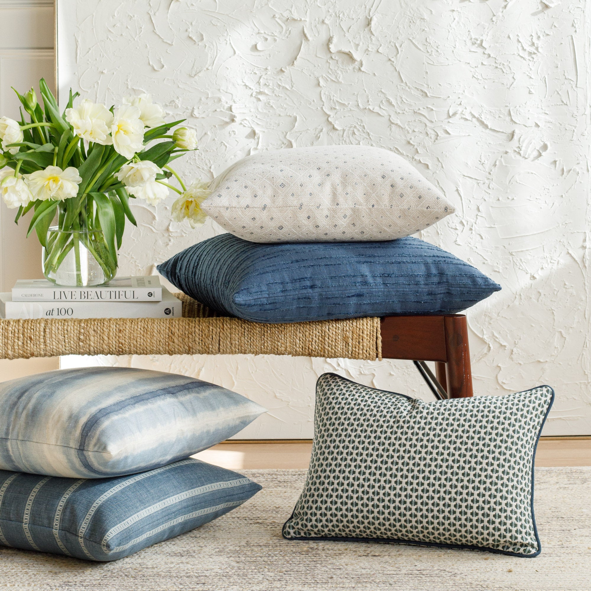 A selection of blue designer pillows from Tonic Living.