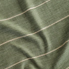 a leafy green with chunky wheat coloured horizontal stripe upholstery fabric