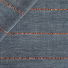 a navy blue with a chunky rust red stripe upholstery fabric