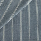 Brunswick Stripe Chambray Fabric, a blue and white vertical striped multi use fabric from Tonic Living