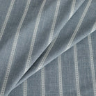 a chambray blue and white woven stripe multi use fabric