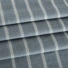 a chambray blue and white striped upholstery fabric from Tonic Living