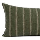 A green and beige striped large lumbar pillow: a close up view.