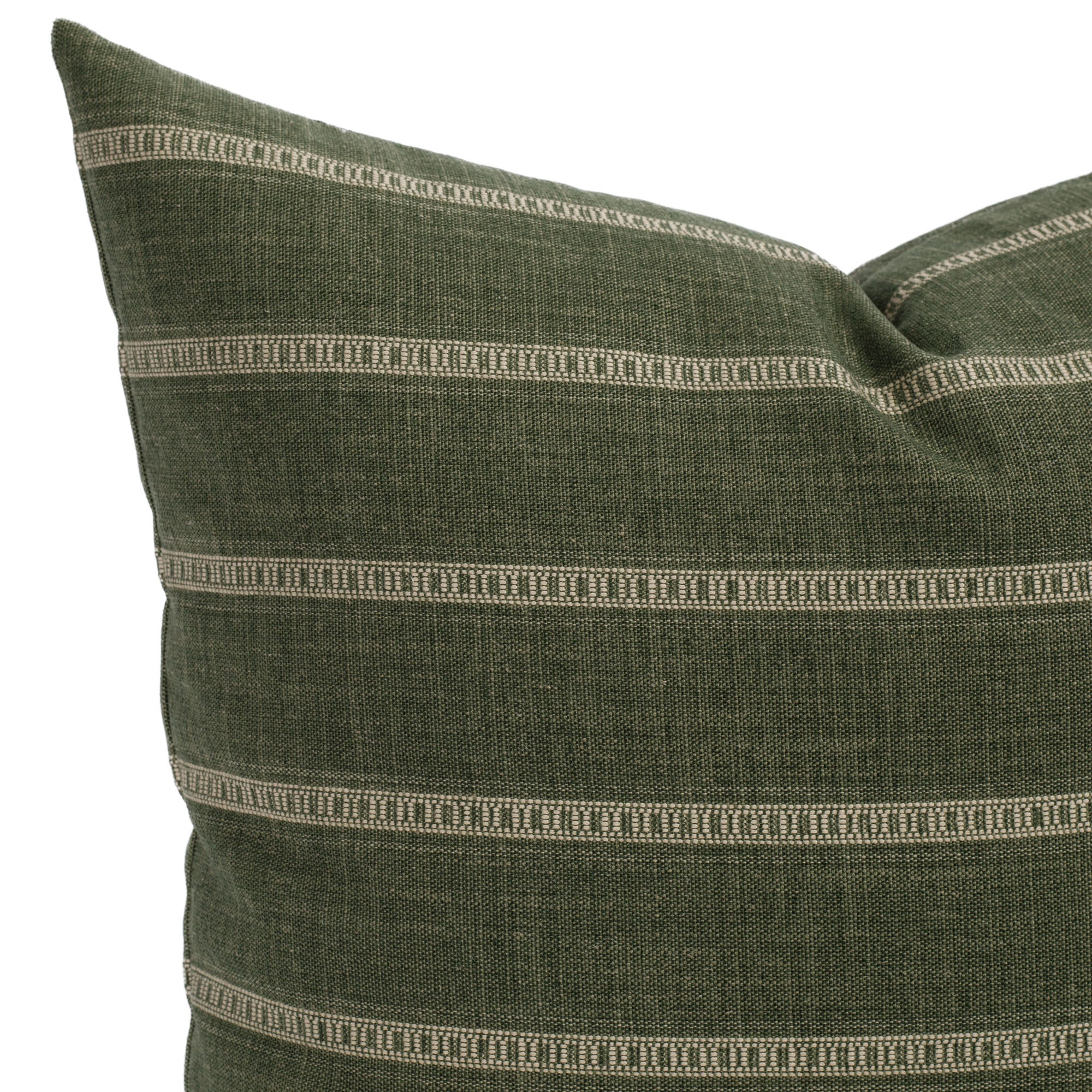 A green and white striped pillow: close up view.