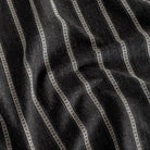 a faded black and soft white stripe home decor fabric