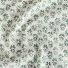 Carmel Pine, a white and green linen curtain fabric.