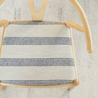 an oatmeal and denim blue loopy stripe fabric upholstered chair seat