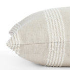 an off white and oatmeal pillow : close up side view