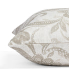 an earthy grey floral print pillow : close up zipper view