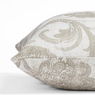 an earthy grey floral print pillow : close up side view