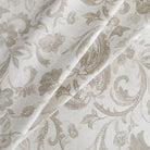 Gia Fabric Pebble, a monochromatic oatmeal and earthy grey Jacobean floral print home decor fabric from Tonic Living