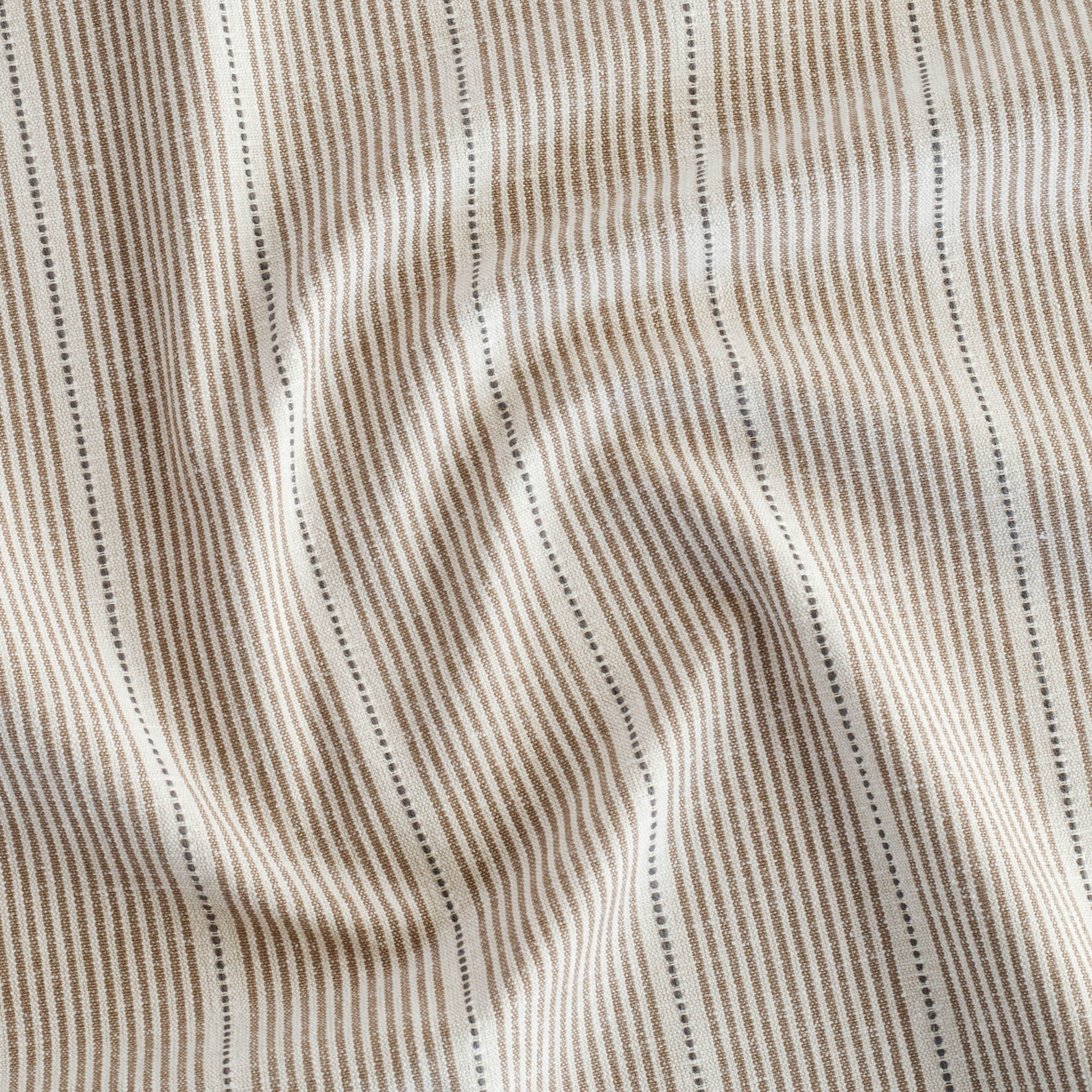 a brown, cream and black stripe patterned multi-use fabric