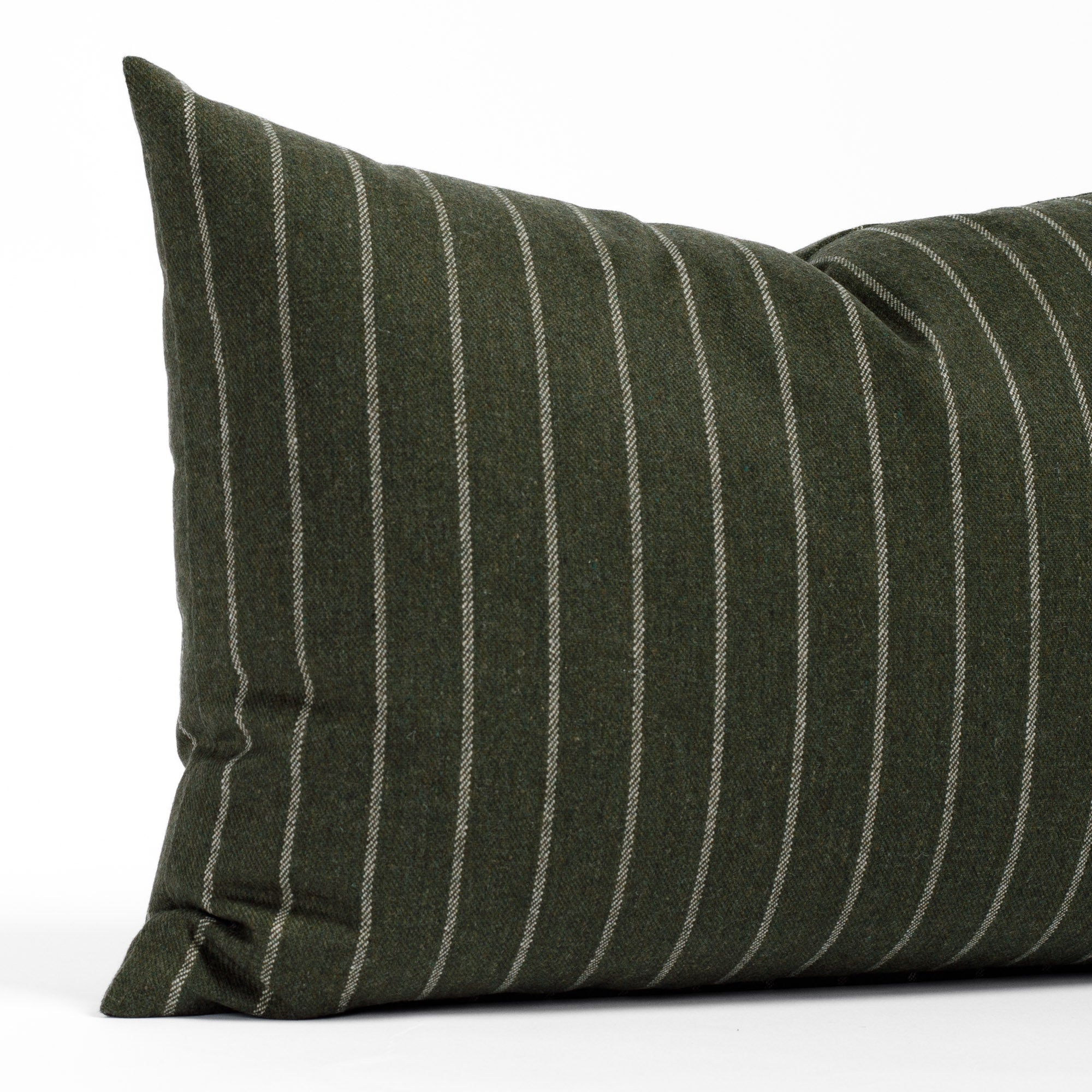 a hunter green and cream striped lumbar pillow: close up view