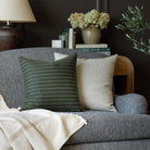 Tonic Living home decor : Hunter Moss and Brussels oatmeal pillows on a sofa upholstered in Porter Sable fabric