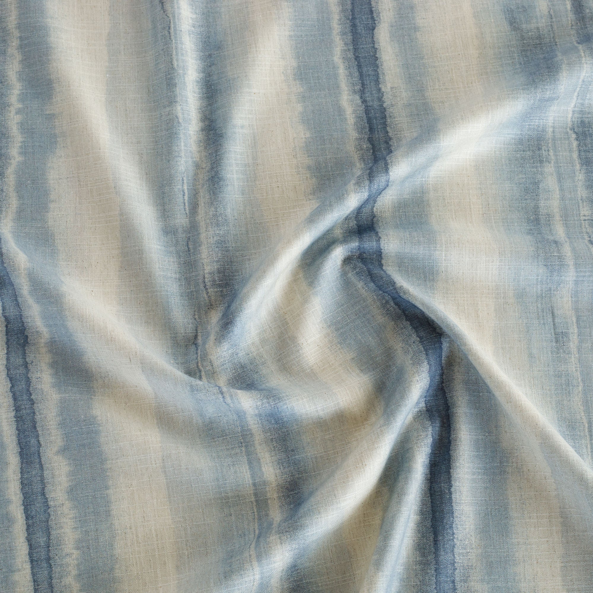 a painterly blue ombre stripe print multi use fabric