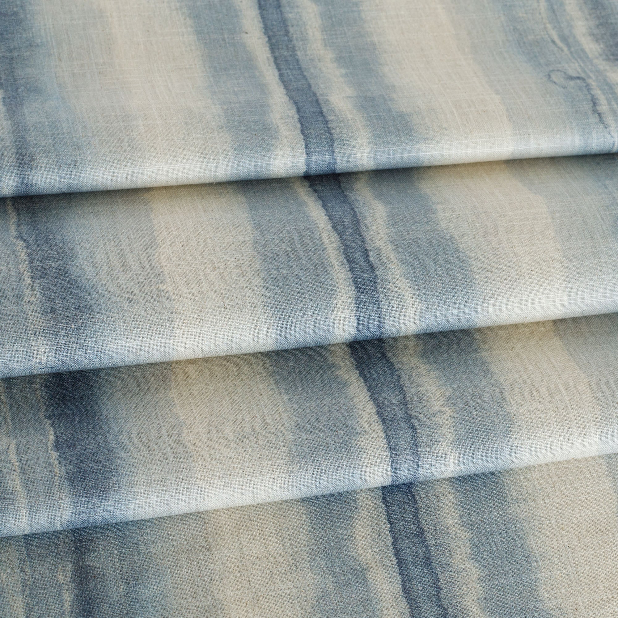 a painterly blue ombre stripe print home decor fabric