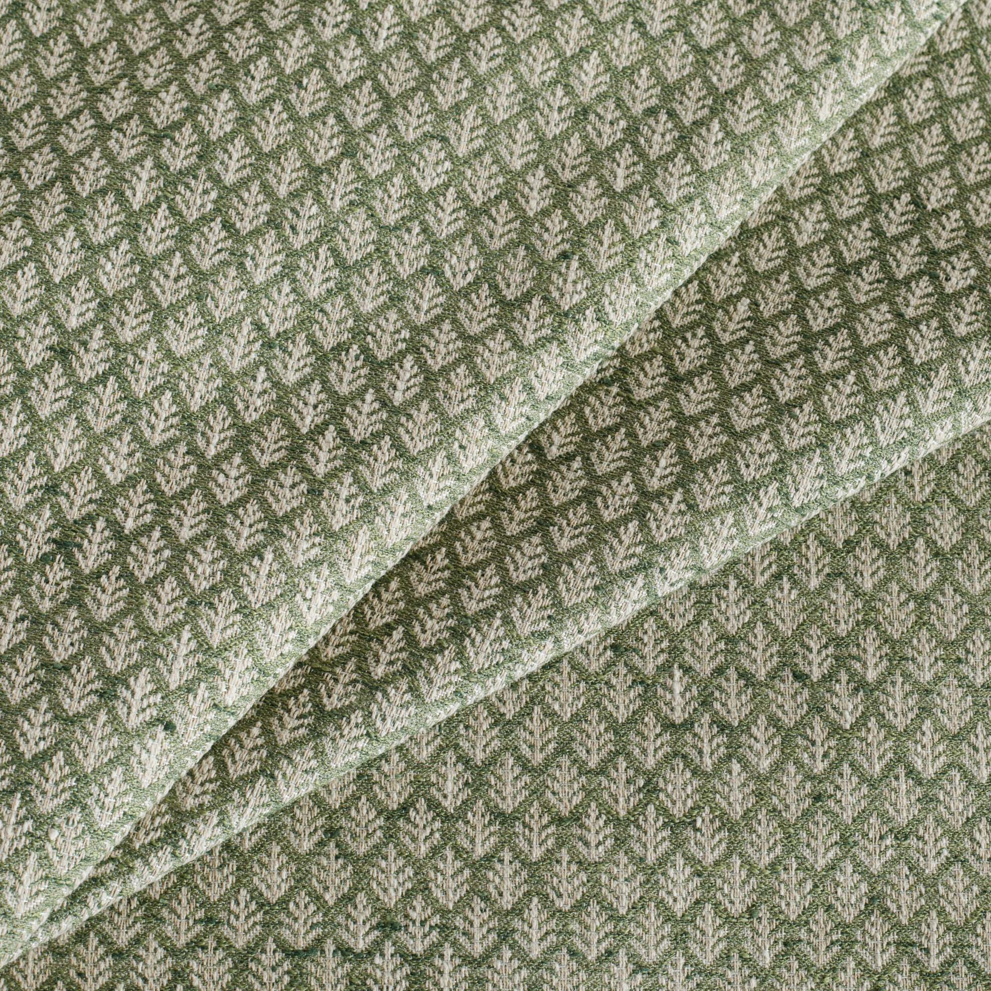 Liora Fabric, a pine green, botanical leaf-patterned upholstery fabric from Tonic Living