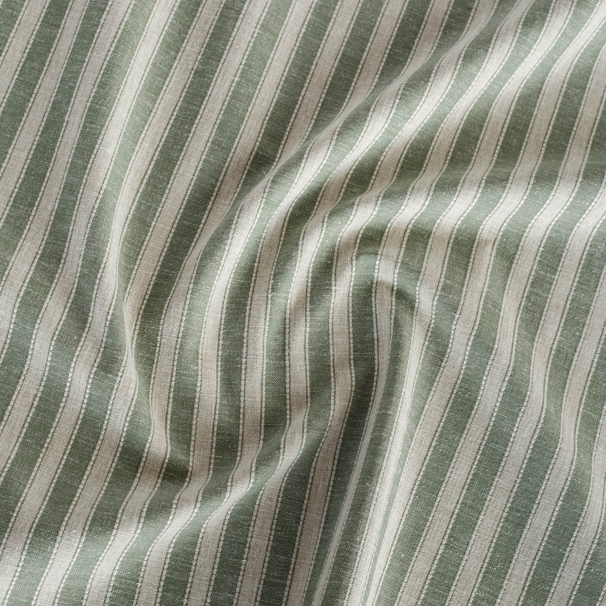 a sage green and oatmeal beige striped multi use fabric from Tonic Living