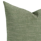 A meadow green textured pillow: close up view.