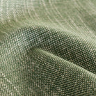 a light green upholstery fabric : close up view