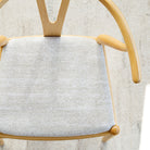 a cream high performance upholstered chair seat