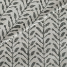 a modern charcoal and beige botanical print multi use fabric