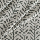 a modern inky charcoal grey and cream botanical print  home decor fabric from Tonic Living