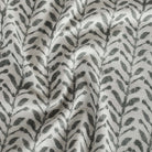 a modern inky charcoal grey and cream botanical print  home decor fabric 