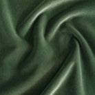 A rich pine green velvet high-performance fabric from Tonic Living.