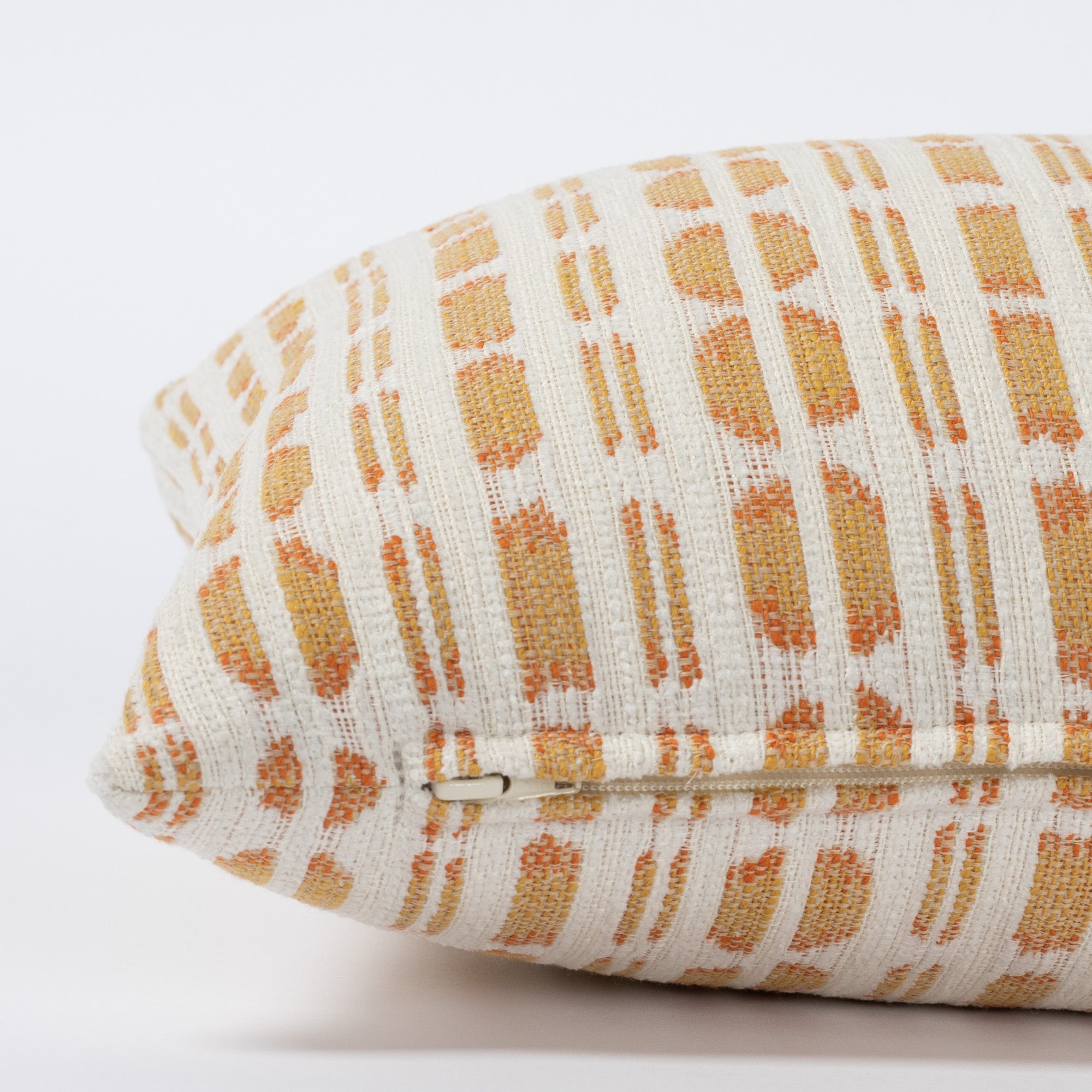 Calima Sunglow yellow, tangerine and white ikat patterned lumbar pillow : view 3
