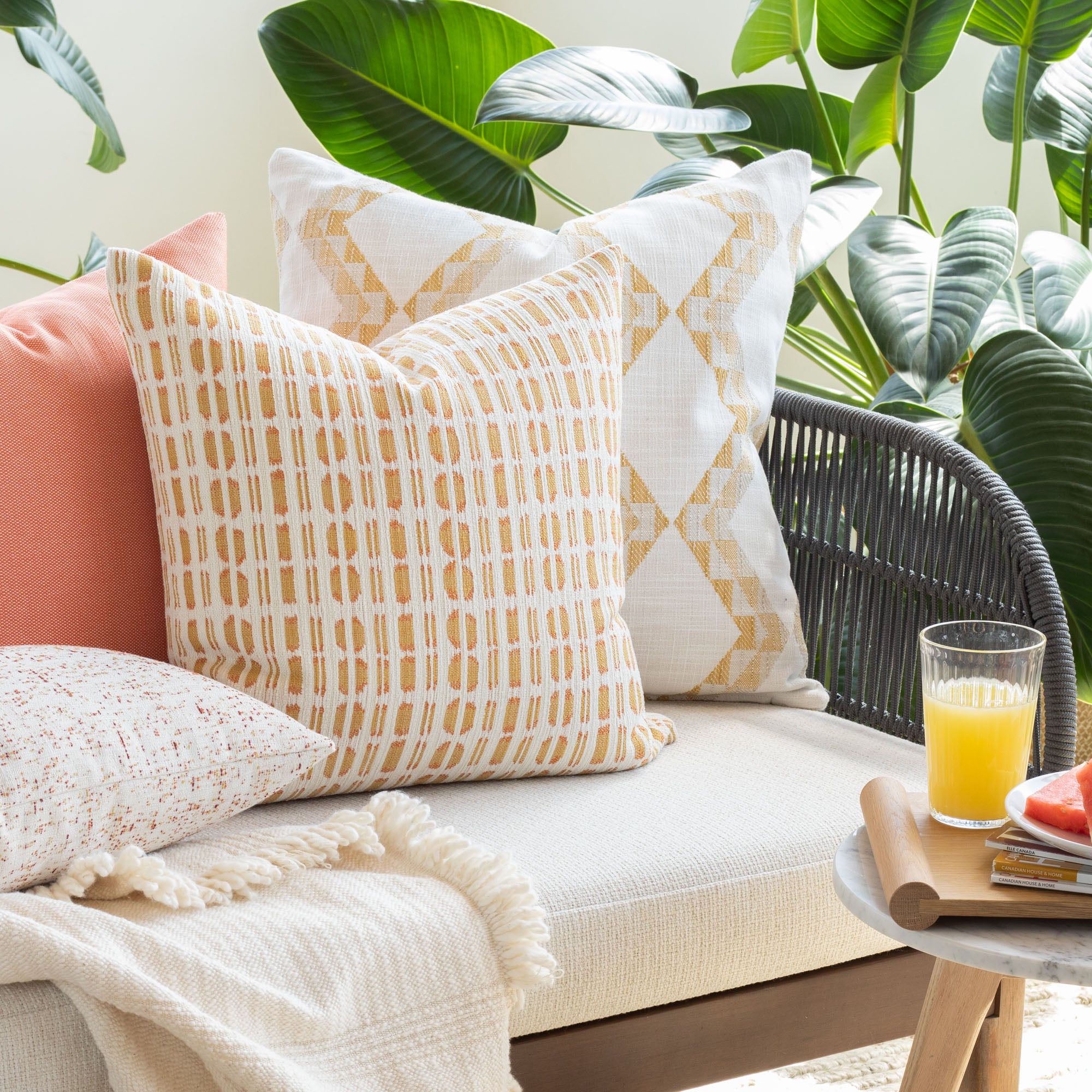 yellow, tangerine and white colourful indoor outdoor pillows from Tonic Living