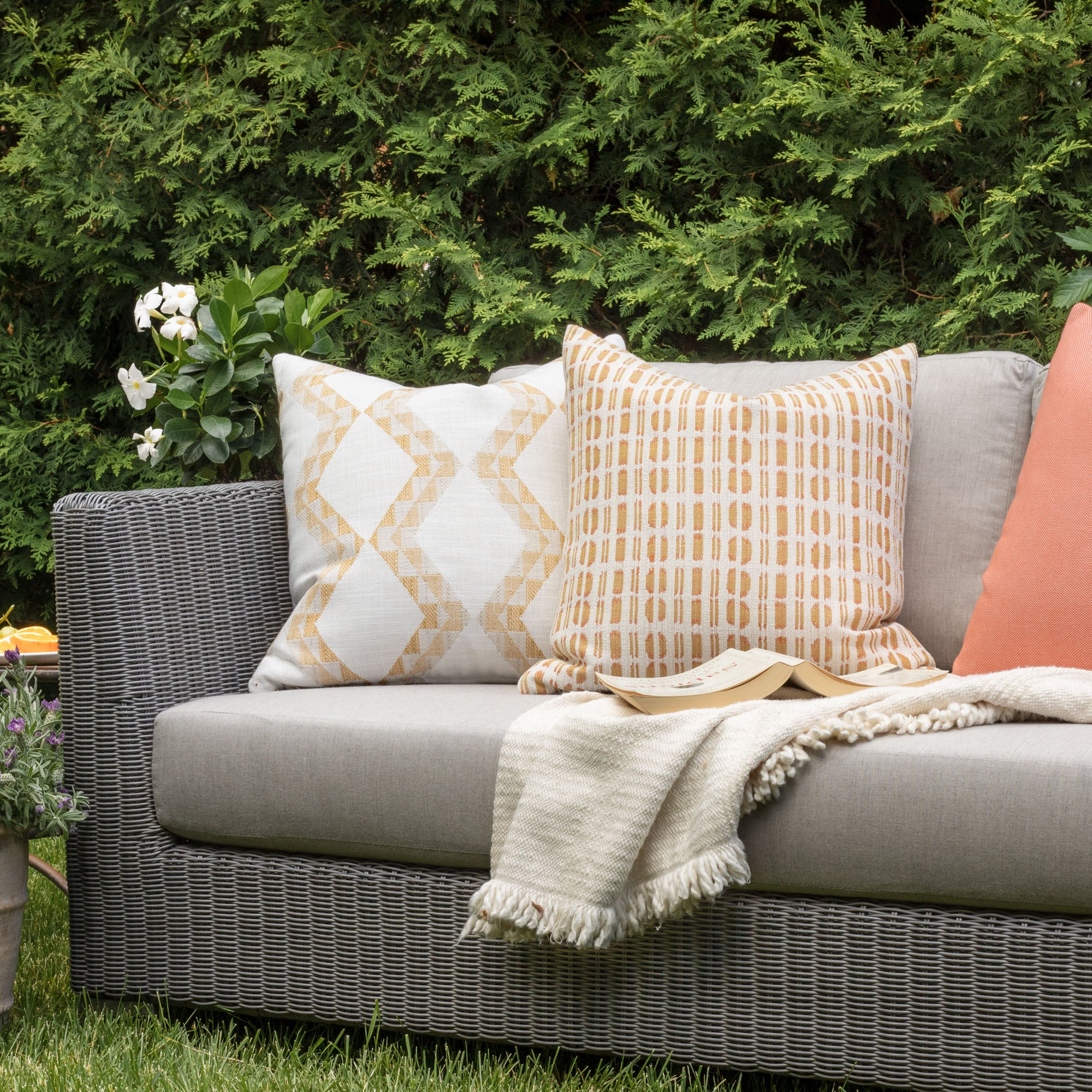 Outdoor Vignette : yellow, tangerine and white colourful indoor outdoor pillows from Tonic Living